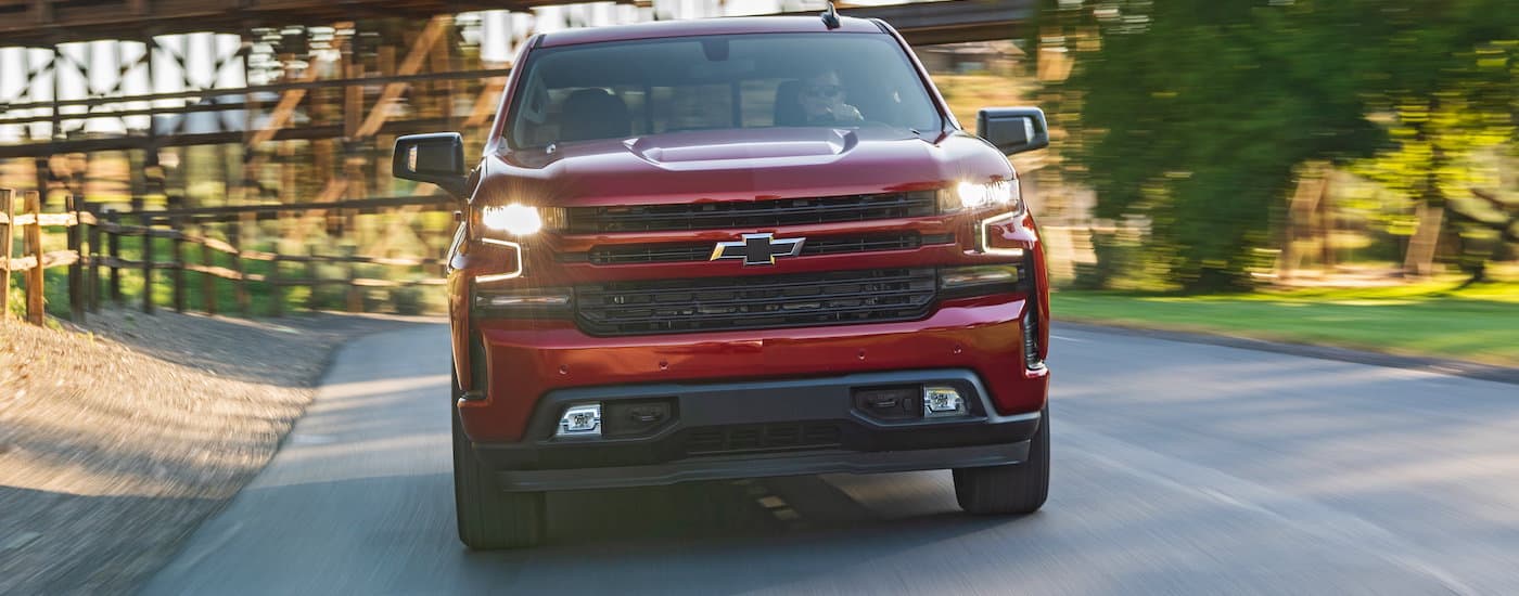 A red 2020 Chevy Silverado 1500 is shown from the front after viewing Chevy used truck sales.