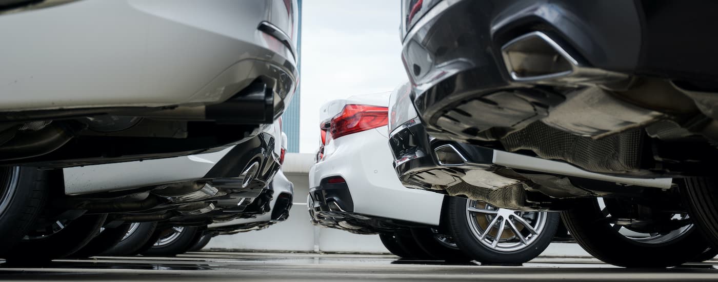 Two rows of cars are shown at a Chevy dealer serving Tulsa.