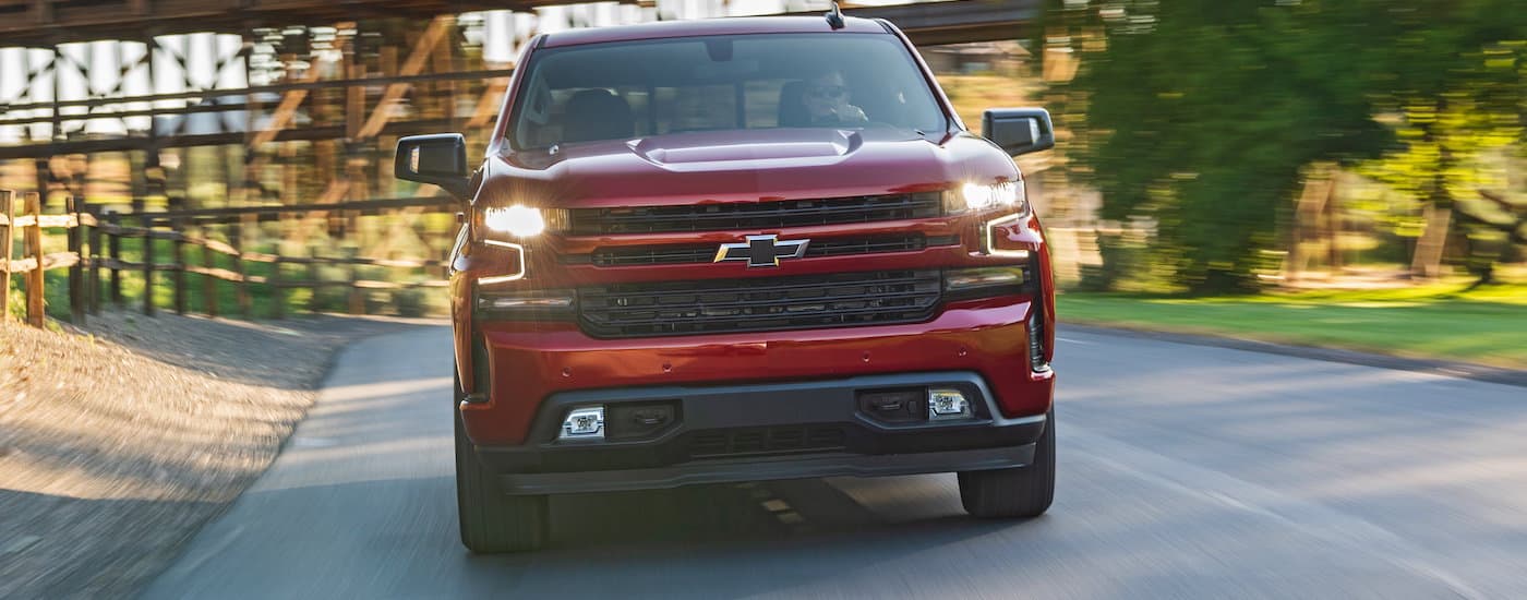 A red 2020 Chevy Silverado 1500 is shown from the front after viewing Chevy used truck sales.